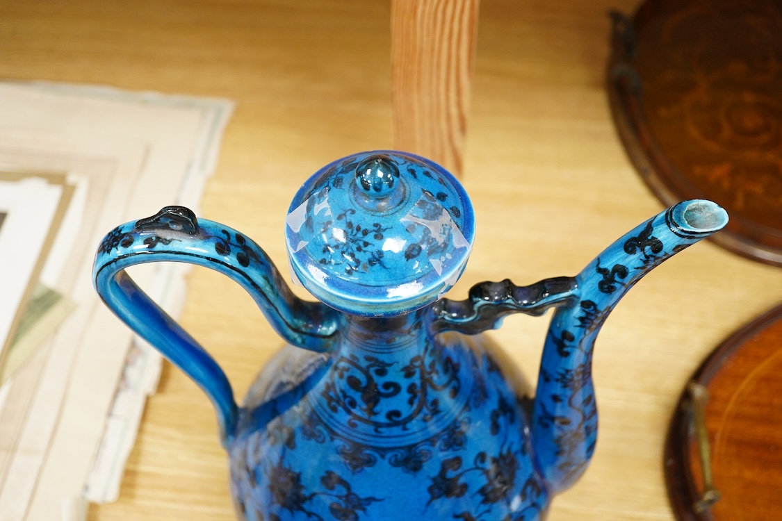 A Chinese blue glazed ewer and cover, 37cm high
